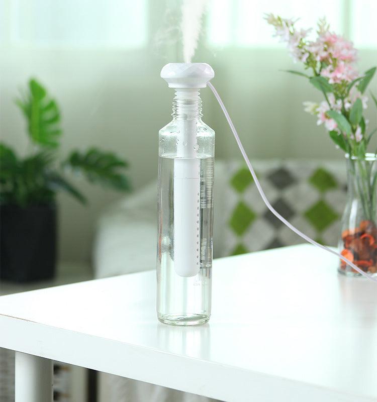 Gift portable mineral water bottle humidifier white household mute water cup large capacity hydration desktop humidifier - ItemBear.com