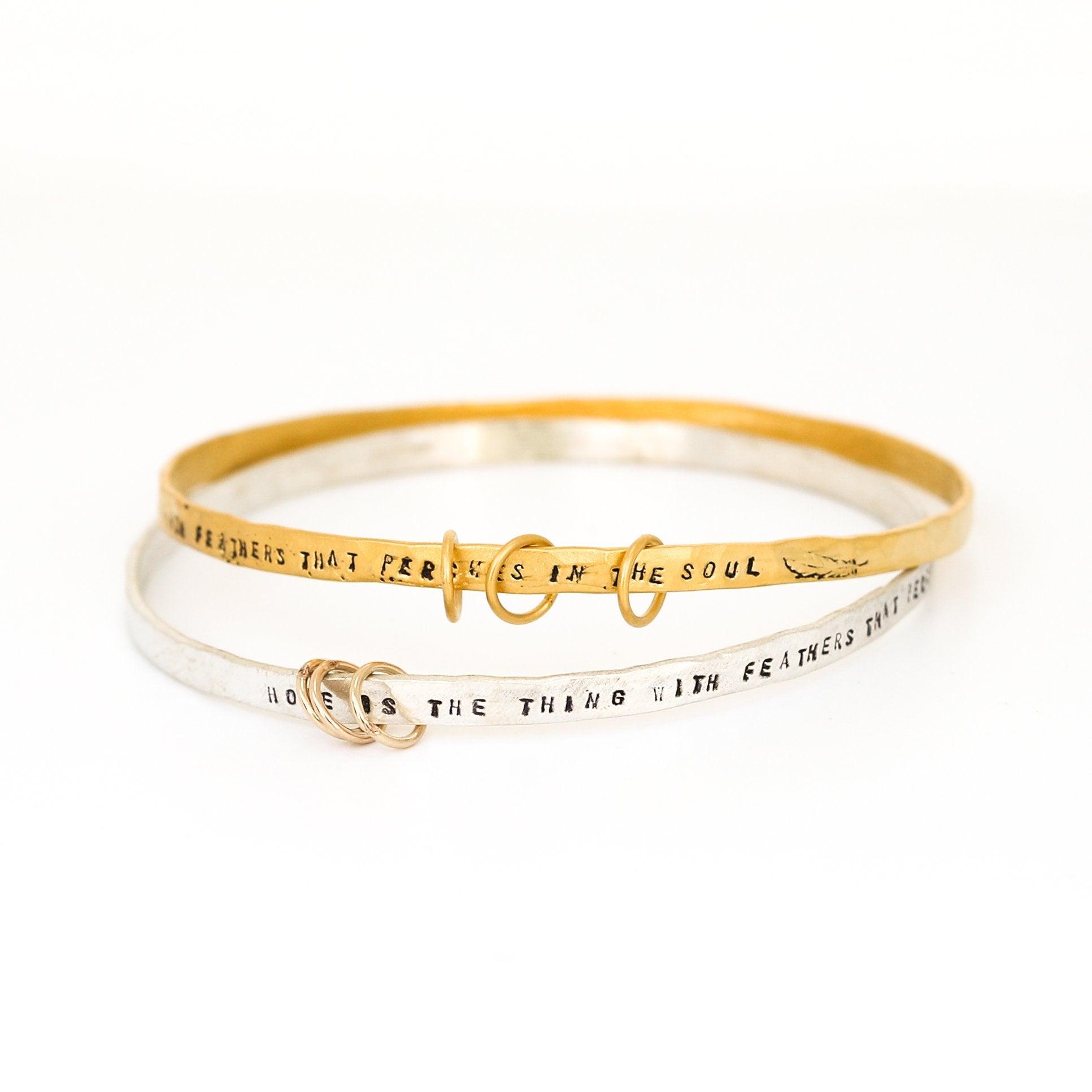 "Hope is the thing with feathers" -Emily Dickinson three ring bangle bracelet - ItemBear.com