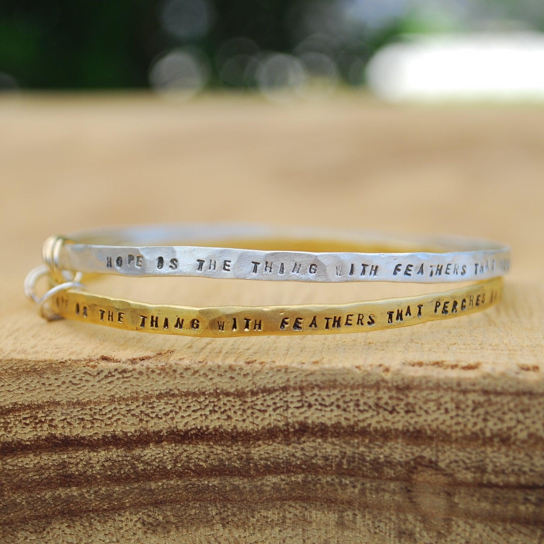 "Hope is the thing with feathers" -Emily Dickinson three ring bangle bracelet - ItemBear.com